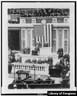 President Calvin Coolidge delivers the first State of the Union Address to be broadcast on the radio, Dec. 6, 1923.