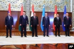 FILE - Leaders of Armenia, Belarus, Tajikistan, Kazakhstan and Kyrgyzstan are pictured with the CSTO secretary general prior to the meeting of the Collective Security Treaty Organization in Dushanbe, Tajikistan, Sept. 16, 2021, in this photo released by the Russian Foreign Ministry Press Service.