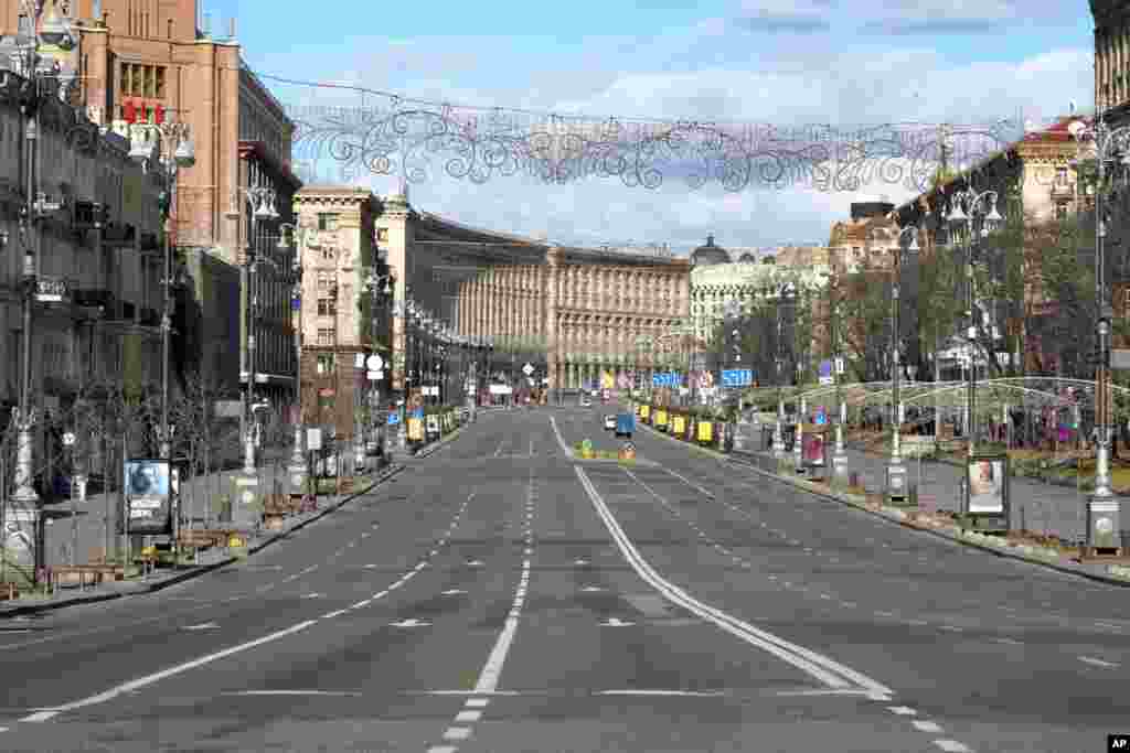 Khreshchatyk, the main street, in the central of Kyiv, Ukraine, is seen empty due to curfew, Feb. 27, 2022.