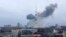 This handout picture released on the Facebook page of the Ukrainian Interior Ministry, March 1, 2022 show the smoke after a missile attack targeting the Ukrainian capital's television center in Kyiv. (Ukrainian Interior Ministry Press Service/AFP) 