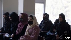 Students attend a class in the Badakshan University after Afghanistan's main universities reopened, in Fayzabad on Feb. 26, 2022.