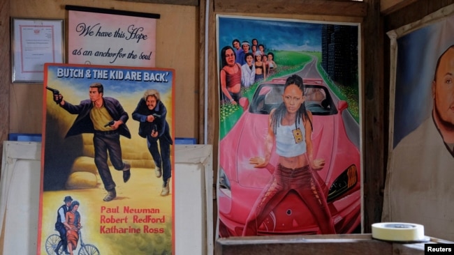 Movie posters commissioned for a foreign client are seen at Ghanaian artist Daniel Anum Jasper's workshop in Accra, Ghana February 20, 2022. (REUTERS/Francis Kokoroko)