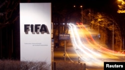 FILE - A long exposure shows FIFA's logo near its headquarters in Zurich, Switzerland, Feb. 27, 2022. 
