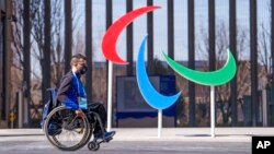 Italy's Matteo Remotti Martini moves in front of the Agitos outside the Paralympic Village ahead of the Beijing 2022 Winter Paralympic Games, Beijing, China, March 3, 2022. 
