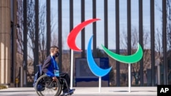 Italy's Matteo Remotti Martini moves in front of the Agitos outside the Paralympic Village ahead of the Beijing 2022 Winter Paralympic Games, Beijing, China, March 3, 2022. 