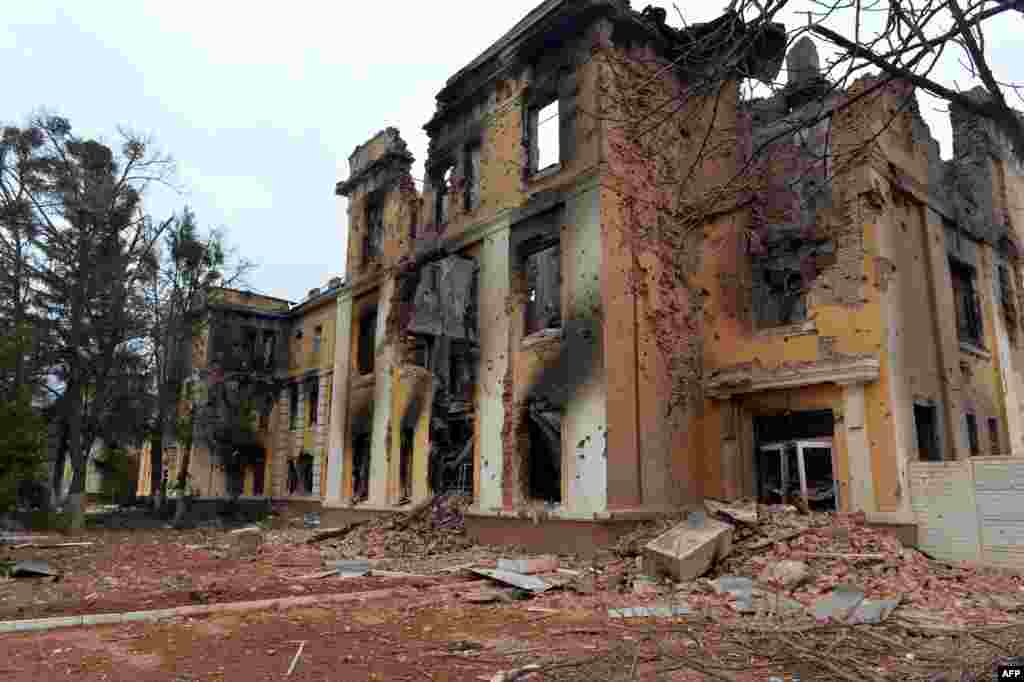This photograph shows a view of a school destroyed by a fighting not far from the center of Ukrainian city of Kharkiv, located some 50 km from Ukrainian-Russian border, Feb. 28, 2022.