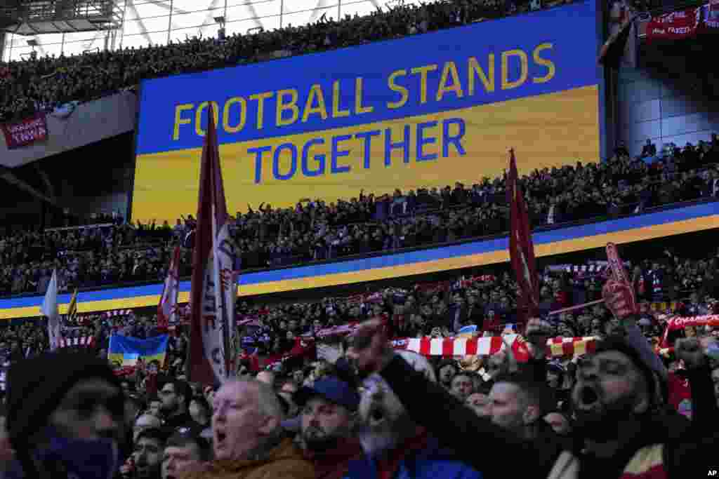 A video screen displays the Ukrainian flag, during the English League Cup final soccer match between Chelsea and Liverpool at Wembley stadium in London.