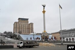 A truck loaded with anti-tanks barriers is parked at Independence Square in Kyiv, Ukraine, March 1, 2022.