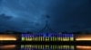 Australia’s Parliament House is seen illuminated with the colors of Ukraine's flag in solidarity with the country's people and government after Russia's invasion of Ukraine, in Canberra, Australia, Feb. 28, 2022.
