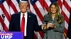 Former US President and Republican presidential candidate Donald Trump and former US First Lady Melania Trump smile after speaking during an election night event at the West Palm Beach Convention Center in West Palm Beach, Florida, early on November 6, 20