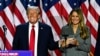 Former U.S. President and Republican presidential candidate Donald Trump and former First Lady Melania Trump smile after speaking during an election night event at the West Palm Beach Convention Center in West Palm Beach, Florida, early on Nov. 6, 2024.