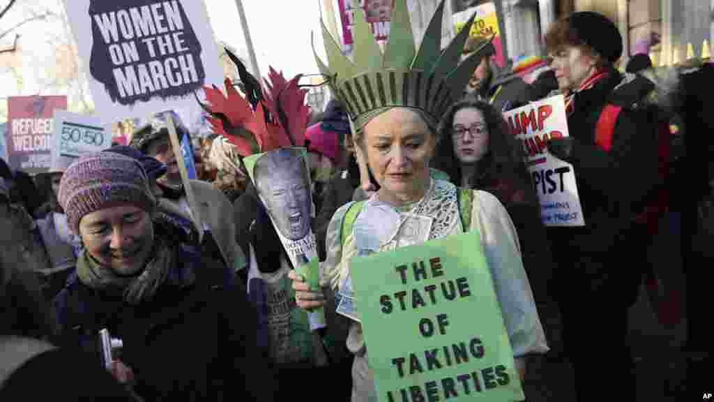 Demonstrators take part in the Women's March on London, following the Inauguration of U.S. President Donald Trump, in London, Jan. 21, 2016.