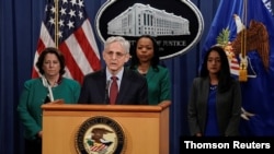 U.S. Attorney General Merrick Garland announces that the Justice Department will file a lawsuit challenging a Georgia election law, in Washington, June 25, 2021.