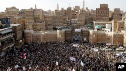 Shiite rebels known as Houthis gather to protest against Saudi-led airstrikes, during a rally in Sanaa, Yemen, April 1, 2015.