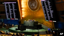 United Nations members vote on a resolution concerning the Ukraine during an emergency meeting of the General Assembly at United Nations headquarters, March 2, 2022. 
