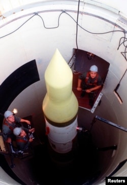 FILE - U.S. Air Force technicians perform an electrical check on an LGM-30F Minuteman III intercontinental ballistic missile in its silo at Whiteman Air Force Base, Missouri in this January 1, 1980 file photo. ( REUTERS/Tech. Sgt. Bob Wickley/USAF/Handout)