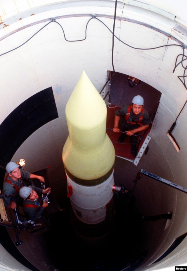 FILE - U.S. Air Force technicians perform an electrical check on an LGM-30F Minuteman III intercontinental ballistic missile in its silo at Whiteman Air Force Base, Missouri in this January 1, 1980 file photo. ( REUTERS/Tech. Sgt. Bob Wickley/USAF/Handout)