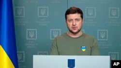 In this image taken from video provided by the Ukrainian Presidential Press Office, Ukrainian President Volodymyr Zelenskyy speaks to the nation in Kyiv, Ukraine, March 3, 2022. (Ukrainian Presidential Press Office via AP)