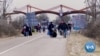 As Russian Assault Intensifies, Ukrainians Pour Into Hungary