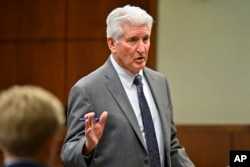 Defense attorney Stewart Mathews gives his closing arguments to the jury in the trial of Brett Hankison, in Louisville, Ky., March 3, 2022.