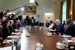 President Joe Biden speaks during a cabinet meeting in the Cabinet Room of the White House, March 3, 2022, in Washington.