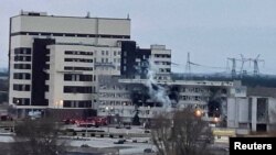 A damaged administrative building of the Zaporizhzhia nuclear power plant is seen in Enerhodar, Ukraine, March 4, 2022.