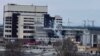 A damaged administrative building of the Zaporizhzhia nuclear power plant in Enerhodar, Ukraine, is seen in this handout photo released March 4, 2022.