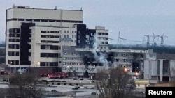 A damaged administrative building of the Zaporizhzhia nuclear power plant in Enerhodar, Ukraine, is seen in this handout photo released March 4, 2022.