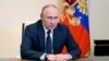 俄罗斯总统弗拉基米尔·普京于 2022年3月3日在俄罗斯莫斯科郊外的新奥加廖沃官邸通过视频会议主持安理会会议。