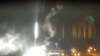 This image made from a video released by Zaporizhzhia nuclear power plant shows a bright flaring object landing in grounds of the nuclear plant in Enerhodar, Ukraine, March 4, 2022. 