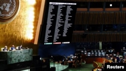 FILE - A general view shows the results of the voting during the 11th emergency special session of the U.N. General Assembly on Russia's invasion of Ukraine, at the United Nations Headquarters in Manhattan, New York City, March 2, 2022.