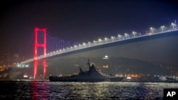 FILE - The Russian Navy's Bykov class corvette 'Dmitry Rogachev' sails through the Bosphorus en route to join the Russian Fleet in the Black Sea, in Istanbul, Feb. 16, 2022.
