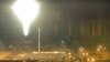 This image made from a video released by Zaporizhzhia nuclear power plant shows bright flaring object landing in grounds of the nuclear plant in Enerhodar, Ukraine March 4, 2022. 