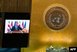 FILE - Cambodia's Prime Minister Hun Sen addresses the 76th session of the United Nations General Assembly at U.N. headquarters in New York, Sept. 25, 2021.