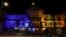 People look on as Cape Town's city hall is illuminated in the colors of the Ukrainian flag in support of Ukraine following its invasion by Russia, in Cape Town, South Africa, March 2, 2022.