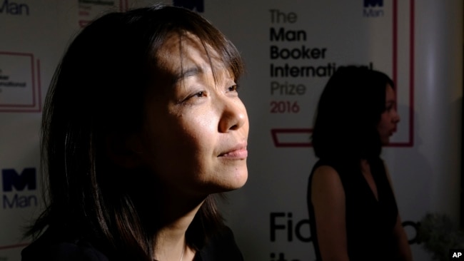 FILE - Han Kang speaks to the media after winning the Man Booker International prize for fiction for her book 'The Vegetarian' in London, Tuesday, May, 16, 2016. Kang has won the Nobel Prize for Literature. (AP Photo/Alastair Grant, File)