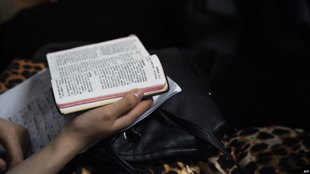 chinese family reading bible