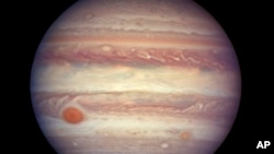 FILE - This April 3, 2017 image made available by NASA shows the planet Jupiter. A newly discovered planet outside our solar system is 12 times the size of Jupiter.