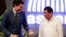 Canadian Prime Minister Justin Trudeau, left, talks to Philippine President Rodrigo Duterte before the opening ceremony of the 31st Association of Southeast Asian Nations summit in Manila, Philippines, Nov. 13, 2017.