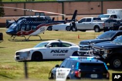 A medical helicopter is seen in front of Apalachee High School after a shooting at the school, Sept. 4, 2024, in Winder, Georgia.