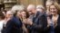 Conservative Party members of Parliament applaud Theresa May, Britain's incoming prime minister, in London, July 11, 2016. 