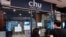 People look inside Chu Chocolate Bar & Cafe days after it permanently closed due to business lost as a result of coronavirus restrictions, in Bangkok, Thailand, June 1, 2021.