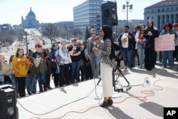 U.S. Rep Ilhan Omar, D-Minn., speaks to high school students from across the state of Minnesota who marched to the State Capitol steps Thursday, March 21, 2019 in St. Paul, Minn.