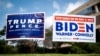 Transparenti podrške predsedniku Trampu i demokratskom protivkandidatu Bajdenu ispred mesta za rano glasanje u Ferfeksu u Virdžiniji, 18. septembra 2020. (Foto: Reuters)