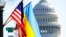 The flags of Ukraine, the United States, and the District of Columbia fly together on Pennsylvania Avenue near the Capitol, March 5, 2022, by order of the mayor of Washington. 