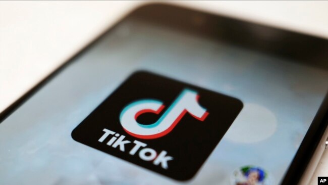 FILE - This Monday, Sept. 28, 2020, file photo, shows the TikTok logo on a smartphone in Tokyo. (AP Photo/Kiichiro Sato, File)