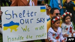 Members and supporters of the Ukrainian community gather to rally in support of Ukraine in Miami, Florida, on March 5, 2022.