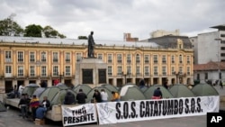 Residentes de la región cocalera del Catatumbo acampan en la Plaza Bolívar en Bogotá, Colombia, después de viajar a la capital para solicitar una reunión con el presidente Gustavo Petro el miércoles 29 de enero de 2025.