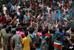 Students protest seeking the arrest of three motorcycle-riding assailants who hacked and shot student activist Nazimuddin Samad to death as he walked with a friend, in Dhaka, Bangladesh, April 7, 2016.