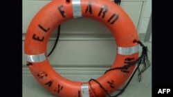 This still image from video taken by the US Coast Guard shows a life ring recovered by the Coast Guard from the El Faro cargo ship, that has gone missing during Hurricane Joaquin. Rescuers were still frantically searching for the El Faro cargo vessel, with which contact was lost early October 1 as the dangerous weather system approached the Bahamas, Oct. 4, 2015.